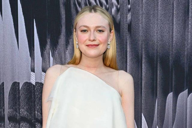 Dakota Fanning Looks Delicate In A Whimsical White Dress At 'Ripley'